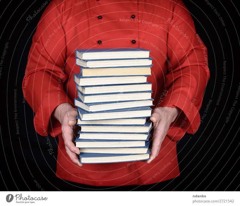 man in red uniform holds a stack of books Elegant Kitchen School Study Profession Cook Man Adults Hand Book Library Clothing Jacket Paper Stand Red Black White