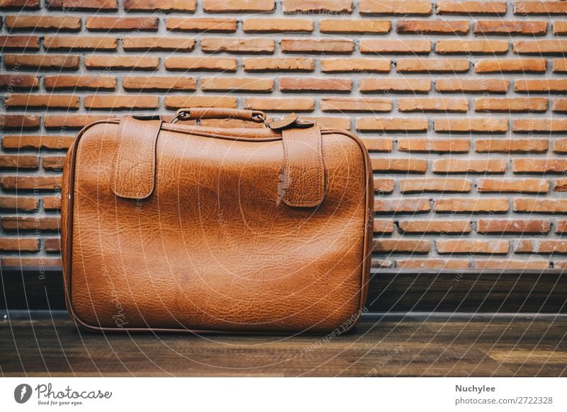 Old vintage leather luggage bag style with brick wall background Style Design Vacation & Travel Tourism Trip Art Transport Fashion Leather Suitcase To fall