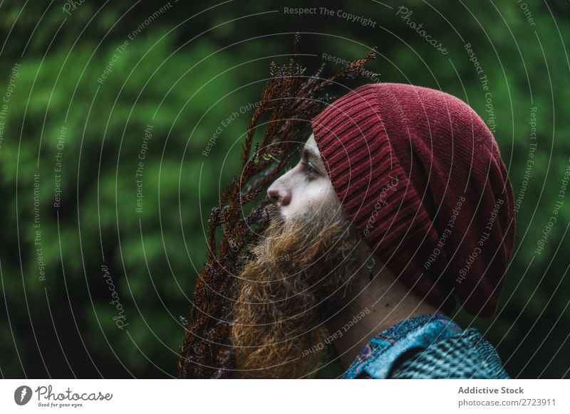 Bearded man standing at branch in forest Tourist Forest Green Man bearded Nature Vacation & Travel Tourism Lifestyle Action Leisure and hobbies Human being