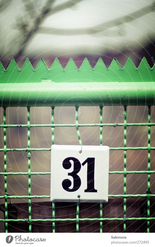 31 Fence Wooden stake Gate Garden door House number Green Black White Bend Point Digits and numbers Signs and labeling Characters Colour photo Multicoloured
