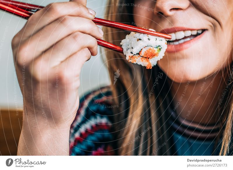 Sushi Set nigiri and sushi rolls on rectangular wooden plates - a Royalty  Free Stock Photo from Photocase