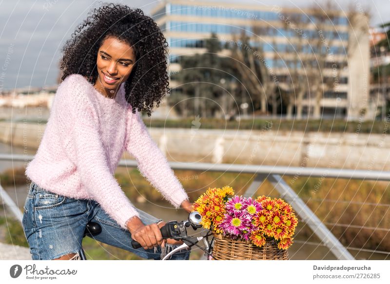 Black young woman riding a vintage bicycle Bicycle Girl Woman Vintage Ride Beautiful Retro Flower Happy Bouquet Summer Youth (Young adults) pretty Spring Basket