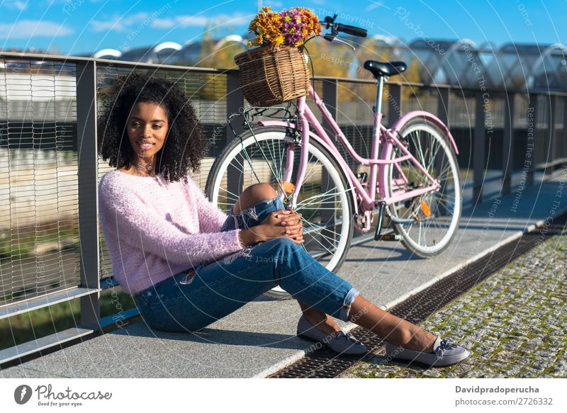 Black young woman sitting by the river with her vintage bicycle Bicycle Girl Beautiful Retro Flower Happy Vintage Bouquet Pink Summer Youth (Young adults) Woman