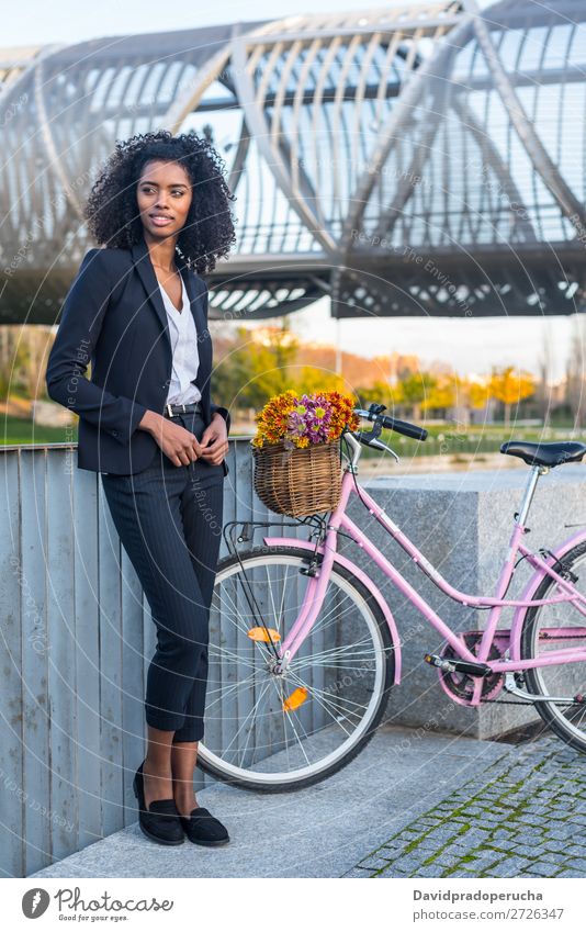 Business black woman with vintage bicycle Bicycle Cycling Vintage Woman Black Mixed race ethnicity City Youth (Young adults) Human being Suit Street Hair