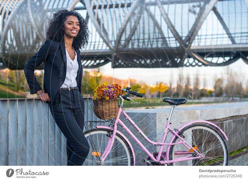 Business black woman with vintage bicycle Bicycle Cycling Vintage Woman Black Mixed race ethnicity City Youth (Young adults) Human being Suit Street Hair