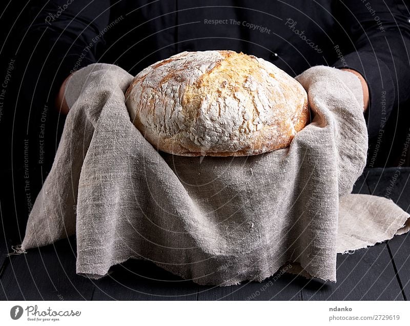 baked round homemade bread Bread Nutrition Table Kitchen Human being Hand Wood Eating Make Dark Fresh Brown Black White Tradition Baked goods Baking Baker