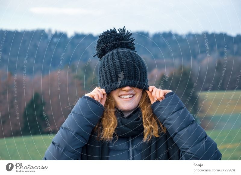 Young girl with a blue cap over her face Lifestyle Joy Happy Trip Winter Hiking Feminine Young woman Youth (Young adults) Face 1 Human being 18 - 30 years
