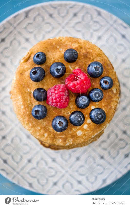 Pancakes with raspberries and blueberries Sweet Dessert Breakfast Blueberry Raspberry Berries Red Baking Food Healthy Eating Food photograph Dish Plate isolated