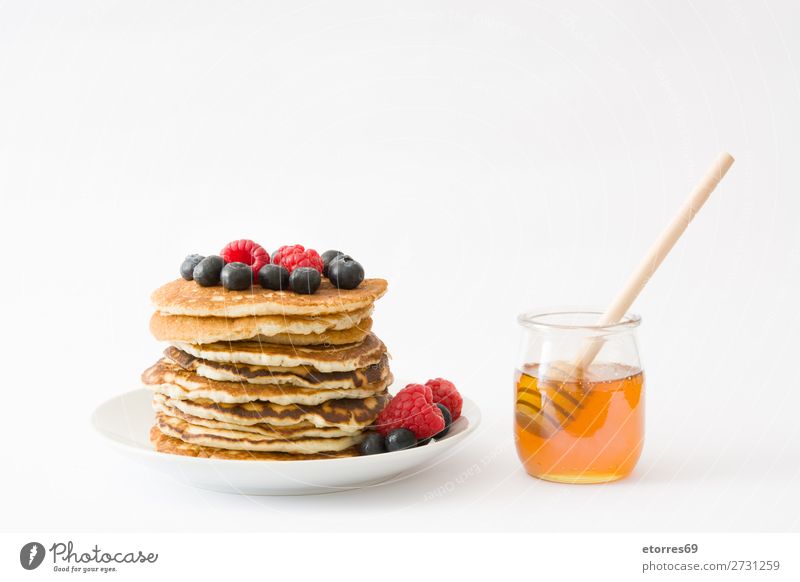 Pancakes with raspberries and blueberries on white Candy Dessert Breakfast Blueberry Raspberry Berries Red Baking Food Healthy Eating Food photograph Dish Plate