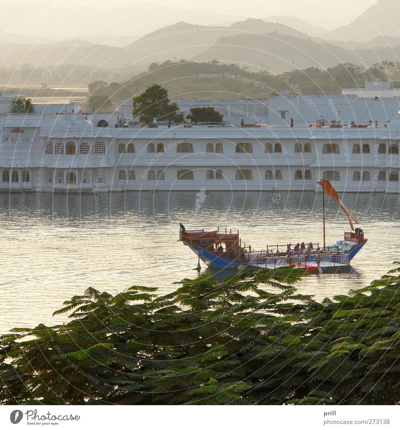 Lake Palace Island Mountain Water Hill Building Architecture Watercraft Stone Adventure Tourism Tradition sea palace India Rajasthan Udaipur chase niwas Hotel
