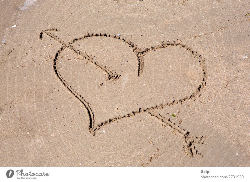 Heart engraved on the wet sand Beautiful Summer Beach Ocean Sand Coast Love Draw Write Wet Gold Emotions Passion Romance Puppy love Carve character drawing