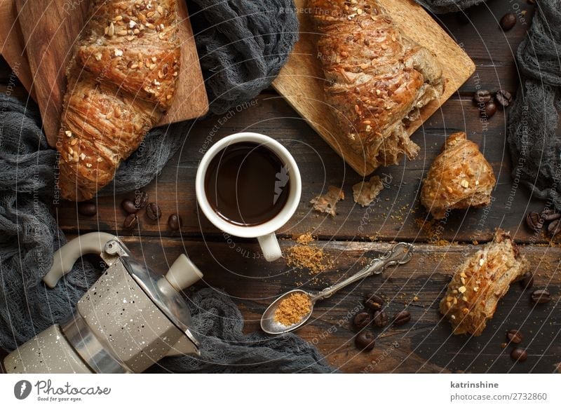 Breakfast with coffee and croissant Bread Croissant Dessert Beverage Coffee Espresso Spoon Table Dark Fresh Delicious Brown Tradition background Bakery Caffeine