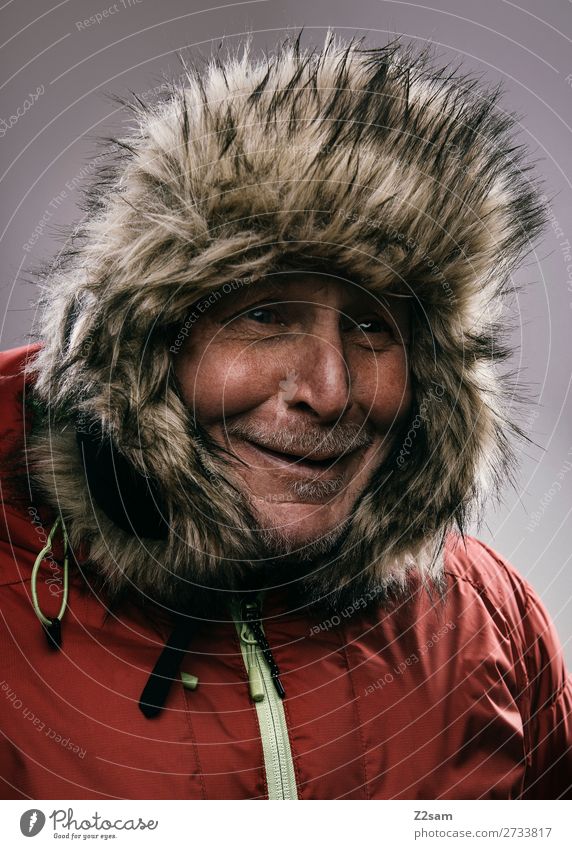 Portrait of a pensioner in a winter outfit Lifestyle Male senior Man 60 years and older Senior citizen Winter Fashion Jacket outdoor clothing Cap Smiling