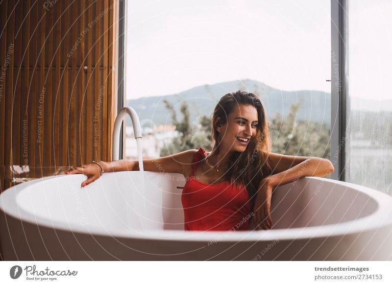 https://www.photocase.com/photos/2734153-woman-in-a-modern-bath-tub-lifestyle-luxury-photocase-stock-photo-large.jpeg