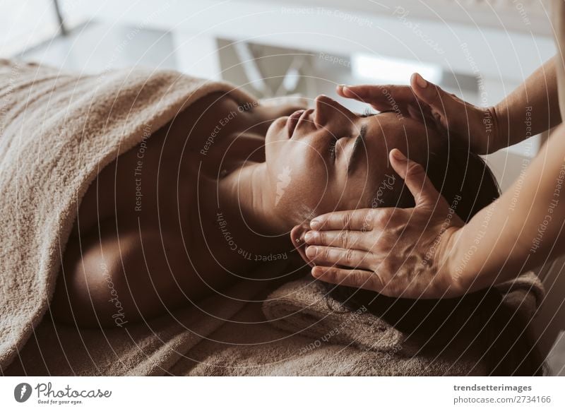 Handsome young man lying and having back massage in spa salon during winter  season 2007521 Stock Photo at Vecteezy