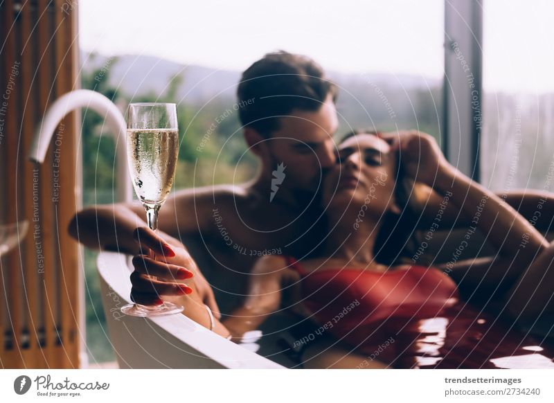 Couple enjoying a bath with champagne Alcoholic drinks Lifestyle Luxury Happy Beautiful Wellness Relaxation Spa Leisure and hobbies Vacation & Travel Woman