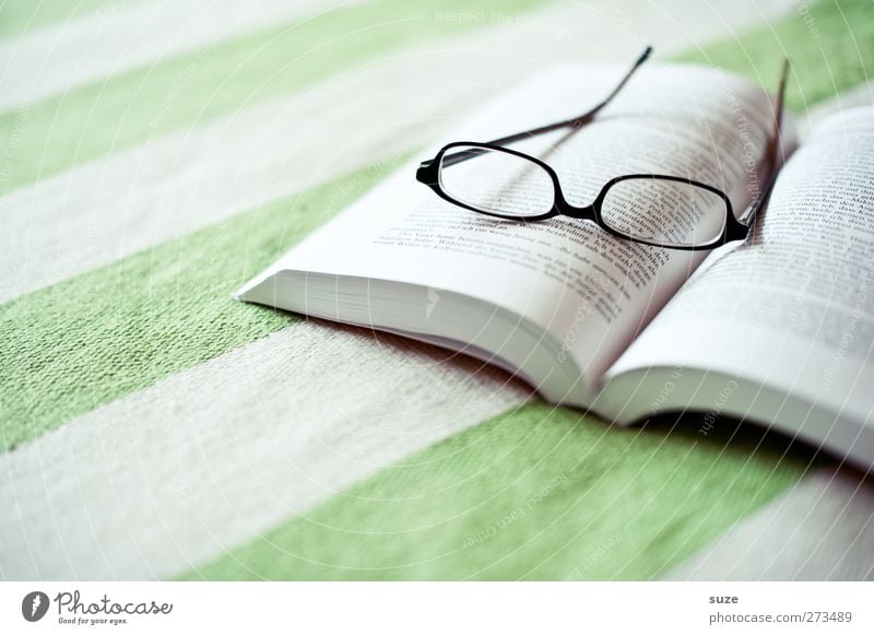 reading Harmonious Well-being Relaxation Calm Leisure and hobbies Reading Living or residing Table Book Eyeglasses Stripe Bright Break Know Time Afternoon