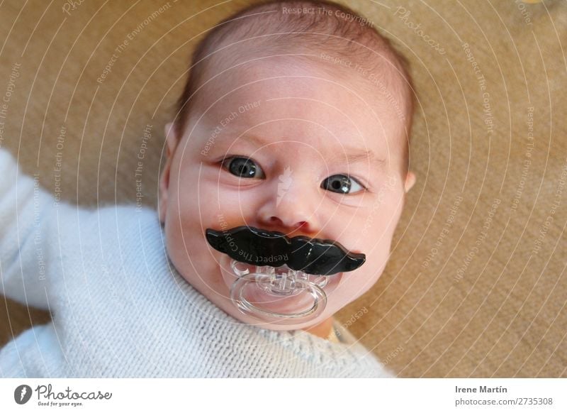 Baby with a big moustache Parenting Human being Feminine Child Toddler Girl Infancy Face Eyes 1 0 - 12 months Short-haired Moustache Toys Observe Looking Blonde