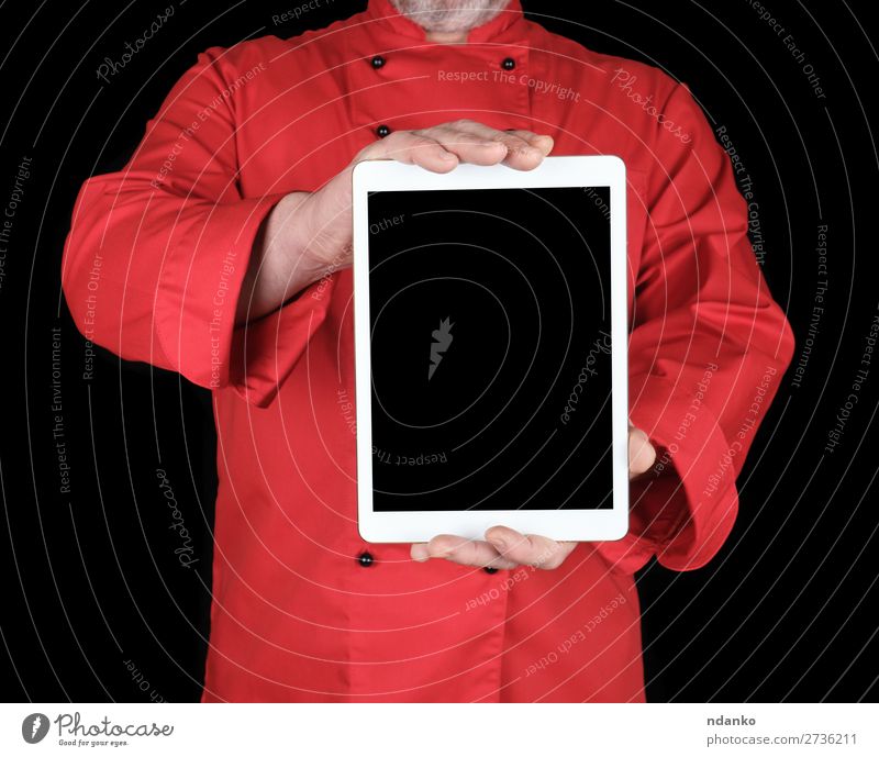 chef in a red uniform holding a white electronic tablet Cook Business Computer Notebook Screen Technology Internet Human being Man Adults Hand Shirt Stand Red