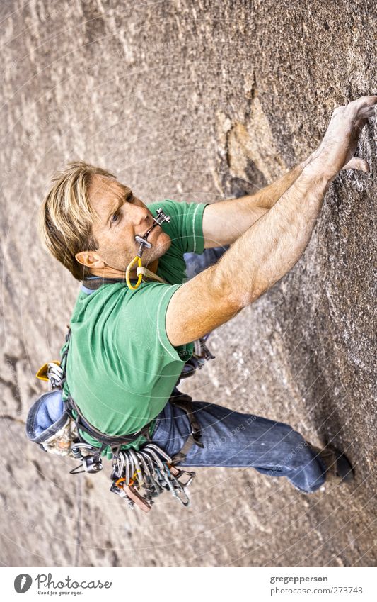 Male rock climber. Relaxation Adventure Climbing Mountaineering Success Rope Masculine Man Adults 1 Human being 30 - 45 years Rock Peak To hold on Hang