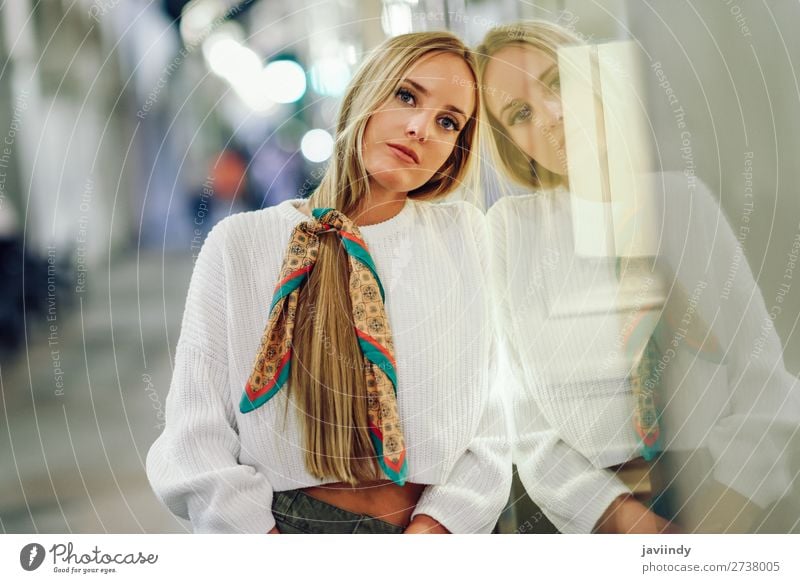 Blonde girl with defocused urban city lights at night Lifestyle Shopping Style Happy Beautiful Hair and hairstyles Winter Human being Feminine Young woman