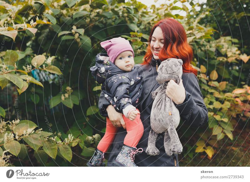 happy family: young mother walks with her child in the Park Lifestyle Hair and hairstyles Healthy Leisure and hobbies Playing Vacation & Travel Adventure