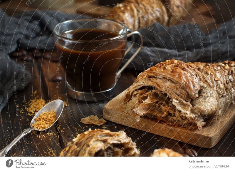 Breakfast with coffee and croissant Bread Croissant Dessert Beverage Coffee Espresso Spoon Table Dark Fresh Delicious Brown Tradition background Bakery Caffeine