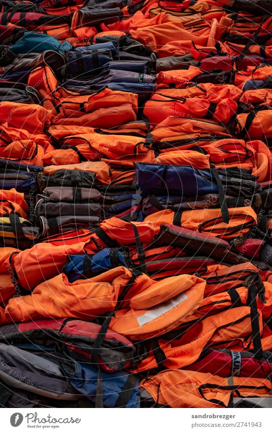 Stacking life jackets Life jacket refugee Escape Water Panic Refugee Boating trip Fear Walking Human being Flee Drown Escape route Loneliness Dangerous Tunnel