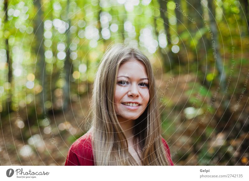 Beautiful woman in a beautiful forest Lifestyle Happy Face Freedom Human being Woman Adults Nature Autumn Wind Tree Park Forest Fashion Blonde Smiling Eroticism