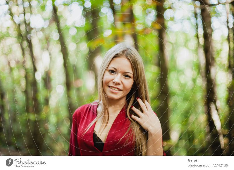 Beautiful woman in a beautiful forest Lifestyle Happy Face Freedom Human being Woman Adults Nature Autumn Wind Tree Park Forest Fashion Blonde Smiling Eroticism