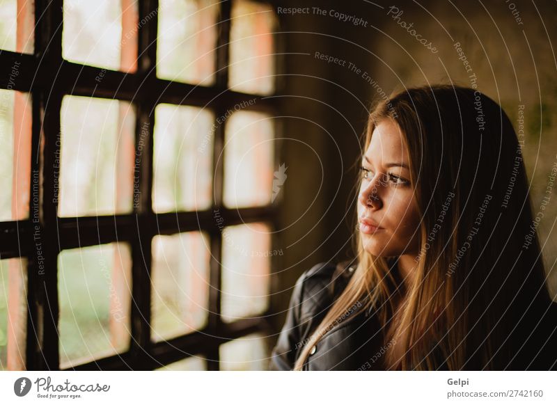 Pensive blonde woman next to a windows Lifestyle Beautiful Face Leisure and hobbies Flat (apartment) House (Residential Structure) Human being Woman Adults