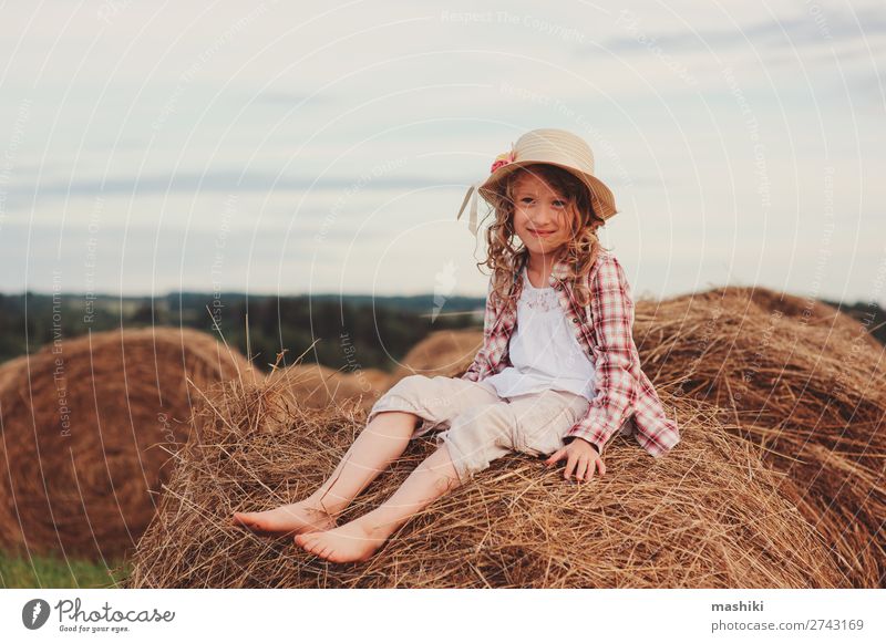 happy child girl in country style plaid shirt Style Joy Relaxation Vacation & Travel Summer Child Infancy Nature Landscape Meadow Shirt Hat Smiling Happiness