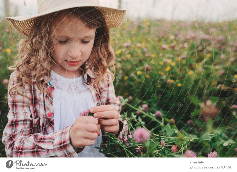 child girl in country style plaid shirt and hat Style Joy Relaxation Vacation & Travel Summer Child Infancy Nature Landscape Meadow Shirt Hat Smiling Happiness