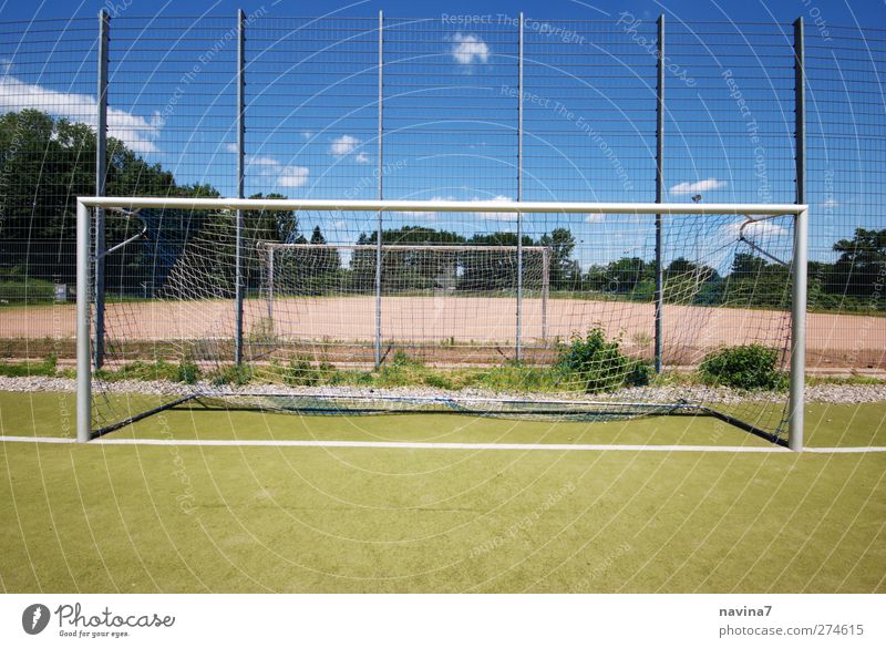 After the game is before the game Ball sports Goalkeeper Sporting Complex Football pitch Sports Blue Boredom Grass surface Empty End Colour photo Multicoloured
