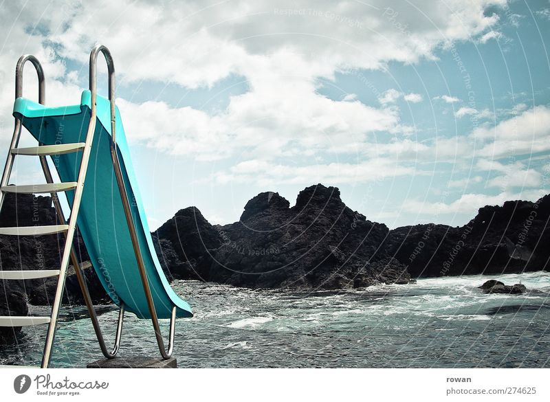 Slide! Relaxation Swimming & Bathing Leisure and hobbies Playing Vacation & Travel Summer Summer vacation Beach Nature Clouds Weather Rock Waves Coast Lakeside