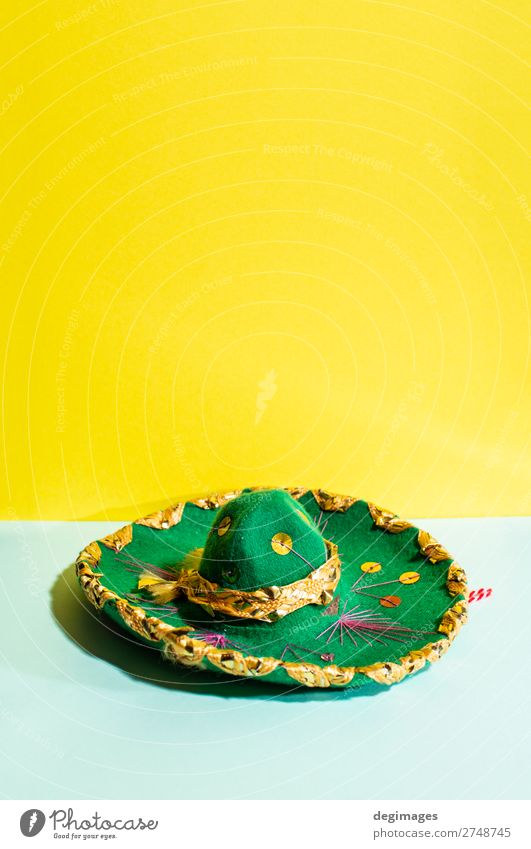 Mexican sombrero hat on geometric yellow and green pastel tones Design Summer Culture Fashion Hat Tradition Sombrero Mexicans background Mexico party fiesta