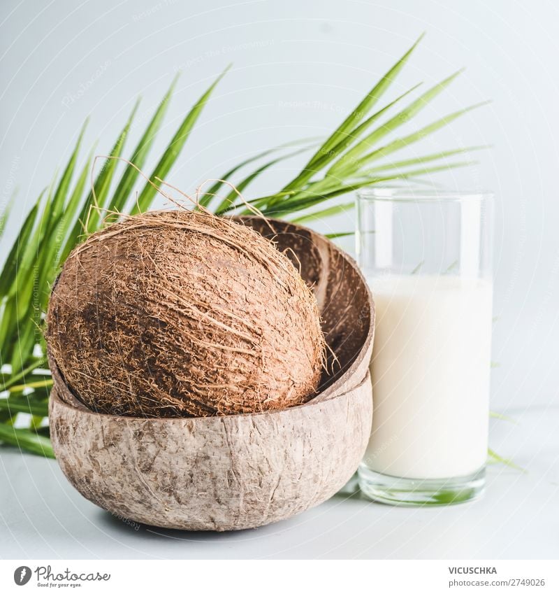 Coconut milk in glass with whole coconut Food Dairy Products Nutrition Organic produce Vegetarian diet Diet Beverage Glass Summer Design Healthy Protein