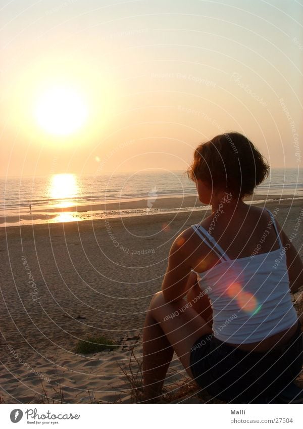 Evening at the Atlantic Ocean Beach Woman Sunset