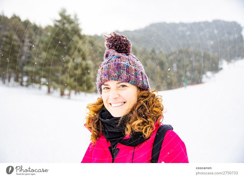 Portrait of attractive woman on a snowy day Joy Happy Beautiful Face Vacation & Travel Adventure Winter Snow Mountain Mother's Day Human being Woman Adults 1