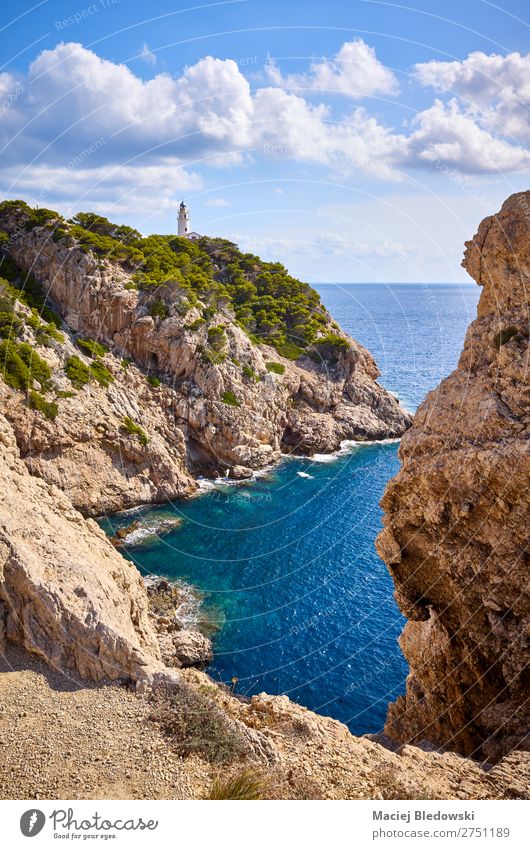 Scenic cove with Capdepera Lighthouse, Mallorca. Vacation & Travel Trip Adventure Far-off places Freedom Summer Sun Ocean Island Nature Landscape Sky Rock Coast