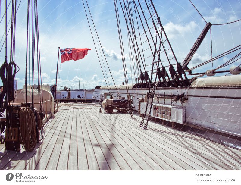 On board Sky Clouds Summer Climate Beautiful weather Navigation Steamer Sailing ship Rope Warship Rigging Cannon Flag Deck Plank Ladder Blue Brown Gray