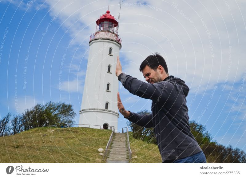 Hiddensee | Italy of the North Island Young man Youth (Young adults) 1 Human being 18 - 30 years Adults Sky Clouds Hill Tower Lighthouse Manmade structures
