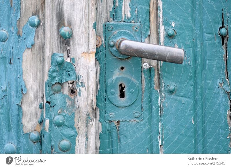 Old Stories Door Wood Silver Turquoise Door lock Door handle plaster Flake off Gate Old building Dye Weather Decline Varnish Colour photo Exterior shot Close-up