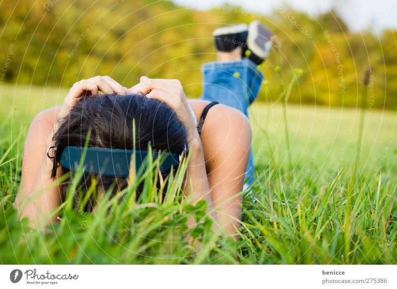 Meadow and music Woman Human being Grass Lie Headphones Music Sound Frustration Contentment Relaxation Summer Spring Loneliness Sadness Grief Hide Feminine