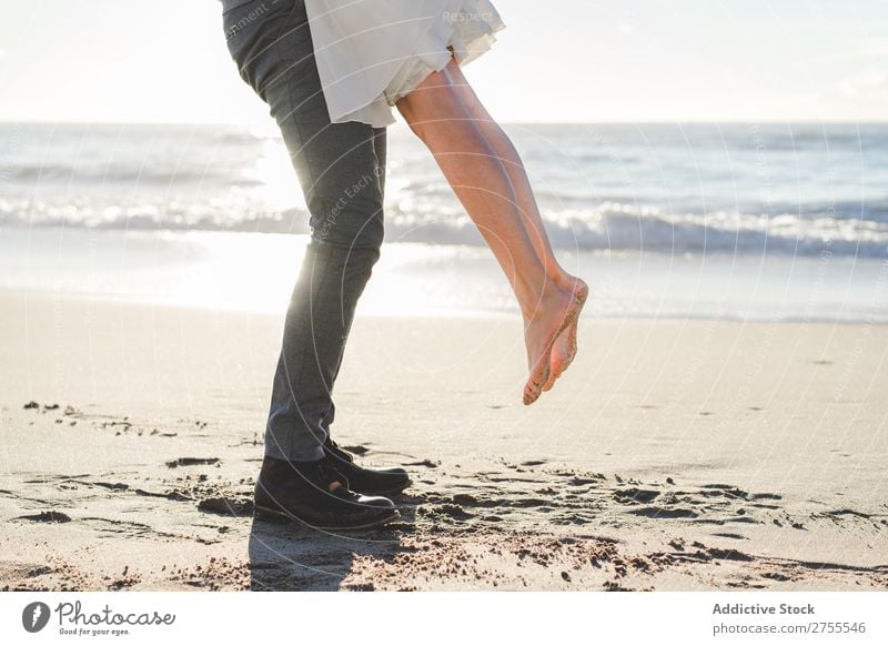 Wonderful bridal couple kissing on beach Couple Kissing Beach Wedding Carrying in love To enjoy amorous embracing Love seaside romantic Together Bride Groom