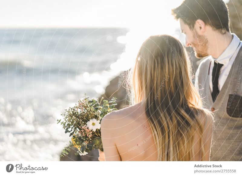 Sensual wedding couple posing on shoreline Couple bridal Beach tender in love Wedding Expression romantic Feasts & Celebrations Style Relationship Love