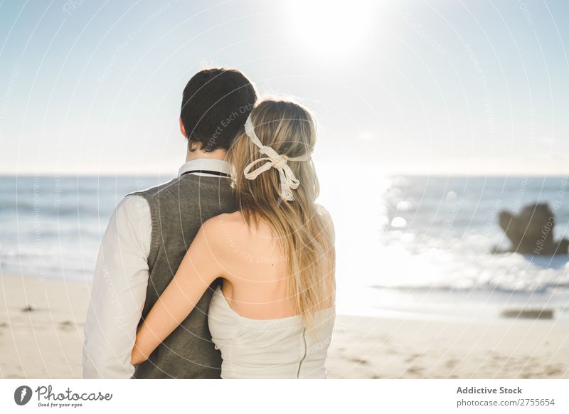 Bridal couple embraced on the beach Couple bridal Beach tender in love Wedding Expression romantic Feasts & Celebrations Style Relationship Love Engagement