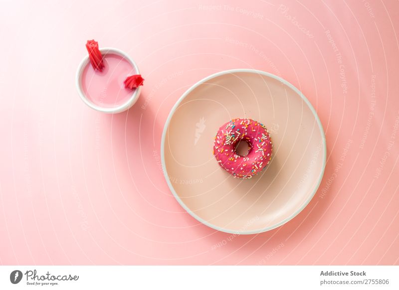 Sweet pink doughnut and sweet pink drink with jelly candies Drinking Jelly Pink Cup Mug Confectionary Milkshake White flavored Studio shot Sugar Dessert