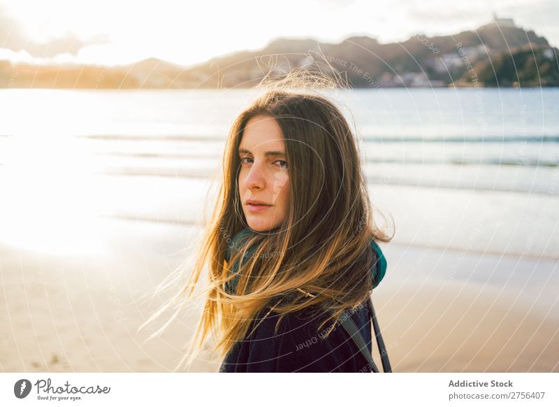 Young dreamy woman at seaside Woman Youth (Young adults) Coast Ocean Looking away Stand pretty Attractive Nature Water Vacation & Travel Beach San Sebastián