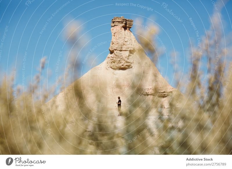 Man posing on the hill of a dune Nature Life Calm tranquil Summer Warmth Heat Beautiful Hot Sunbeam Pollination Dust Day Exterior shot Desert Cliff